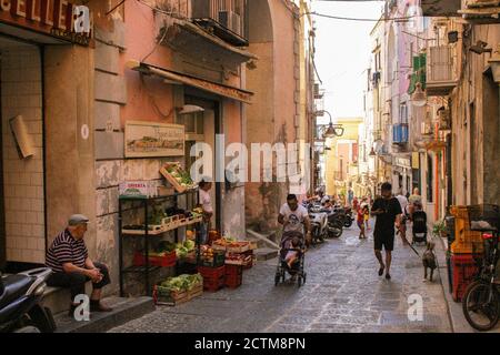 Procida, Province of Naples, Campania, Italy. Isle of Procida, Marina Grande. Marina Grande, the town of Procida where there is the main port of the island.Scenes of daily life in a street of the village. Stock Photo