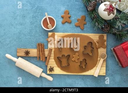 Top view on rolled out dough for christmas gingerbread cookies Stock Photo