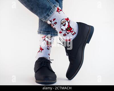 Men's legs, trendy shoes and bright socks Stock Photo