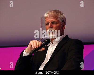 Former chairman of the NATO Military Committee and founder of the Together Stronger initiative general Petr Pavel, wearing a shield, speaks during a d Stock Photo