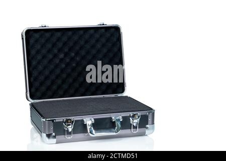 Opened new toolbox isolated on white background. Empty tool box with handle. Silver aluminium and black plastic suitcase. Modern case for toolkit. Bla Stock Photo