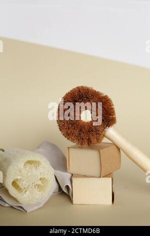 hand and old sponge wash, dish washing sponge, absorbent yellow sponges  cleaning isolated on white background Stock Photo