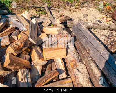 Wood chopped with an ax for heating a rural house. Stock Photo