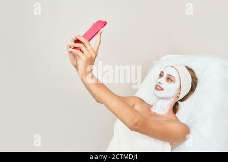 Portrait of moisturizing mask on white background for medical design. Woman Stock Photo