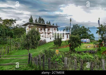 Traditional Bhutanese farmhouse in Punakha, Bhutan Stock Photo