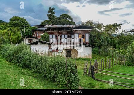 Traditional Bhutanese farmhouse in Punakha, Bhutan Stock Photo