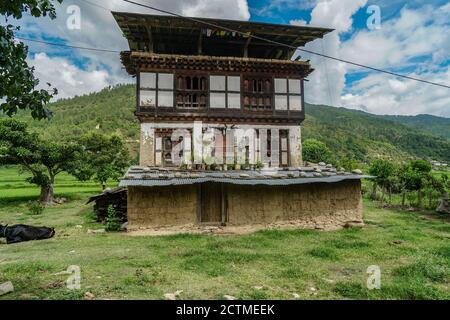 Traditional Bhutanese farmhouse in Punakha, Bhutan Stock Photo