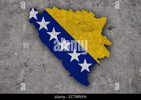 Map and flag of Bosnia and Herzegovina on weathered concrete Stock Photo