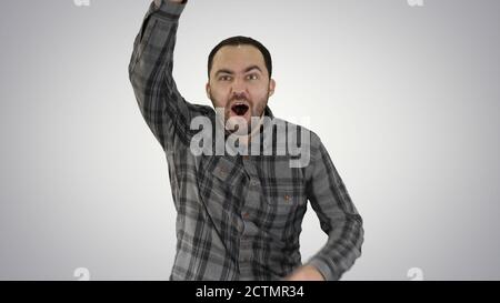 One caucasian man running and calling for someone, trying to get Stock Photo
