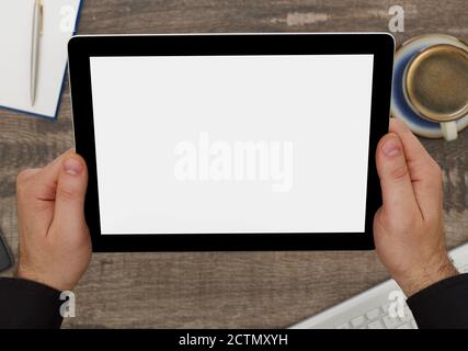 Man holding a digital tablet with blank screen Stock Photo