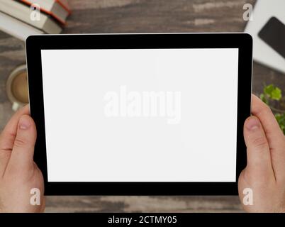 Man holding a digital tablet with blank screen Stock Photo