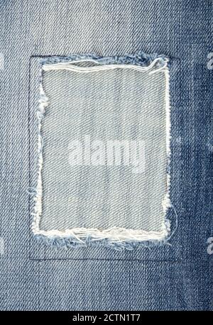 Patched jeans close-up Stock Photo