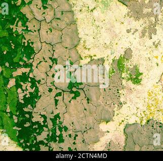 green painted damaged grunge wall background or texture Stock Photo