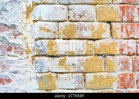 Background of old damaged brick wall texture Stock Photo