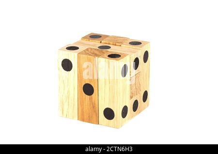 Assembled puzzle dice isolated on white background. Dice or Dot Puzzle. Stock Photo