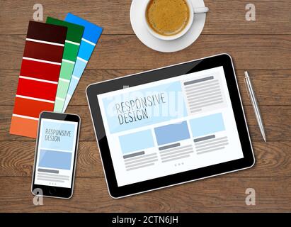 Responsive design on mobile devices on desk Stock Photo