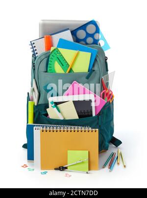 School supplies and backpack on white background Stock Photo