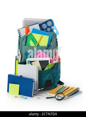 School supplies and backpack on white background Stock Photo