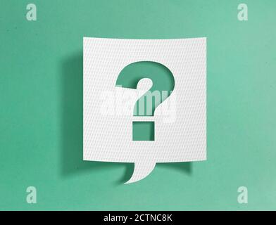 Speech bubble with question mark on green background Stock Photo