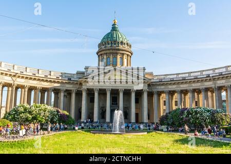 Saint Petersburg, Russia – June 15, 2017. Exterior view of the Kazan Cathedral in Saint Petersburg, with colonnade, vegetation and people. Stock Photo