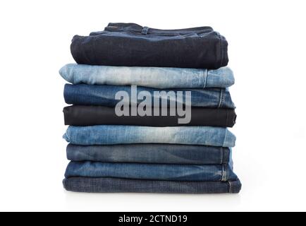 Stack of jeans isolated on white Stock Photo