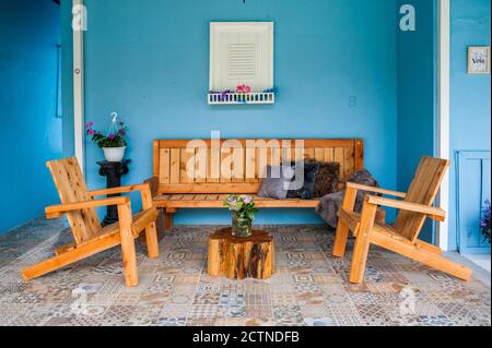 comfortable soft sofa with decorative cushions in spacious modern living  room with parquet floor and white walls near staircase in daylight, AI  Generated 23132763 Stock Photo at Vecteezy