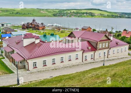 Sviyazhsk, Tatarstan, Russia – June 25, 2017. View over complexes of historical buildings in Sviyazhsk, toward the river boat terminal and Sviyaga Riv Stock Photo