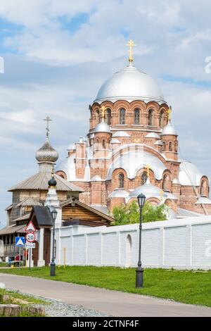 Sviyazhsk, Tatarstan, Russia – June 25, 2017. View of Cathedral in honor of the Icon of the Mother of God ‘The Joy of All the Sorrowful’ and the woode Stock Photo