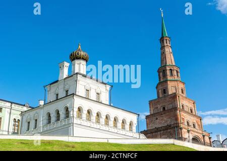 Kazan, Russia – June 27, 2017. Leaning Syuyumbike Tower and House Church of the Kazan Kremlin in Kazan. View with people on a stormy summer day. Stock Photo