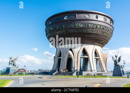 Kazan, Russia – June 27, 2017. View of Kazan Wedding Palace in Kazan. View with grass lawns, people and statues, in summer. Stock Photo