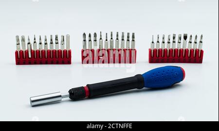 Screwdriver with bit set isolated on white background Stock Photo