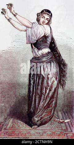 Machine colorized with Artificial Intelligence (AI) Alma or Belly dancing lady of Cairo, Egypt engraving on wood From The human race by Figuier, Louis, (1819-1894) Publication in 1872 Publisher: New York, Appleton Stock Photo