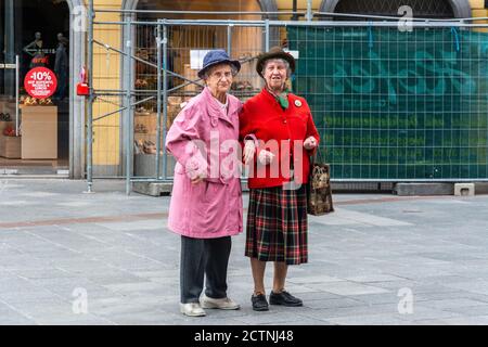 Linz, Austria – May 25, 2017. Two elderly women on a street in downtown Linz, Austria. Stock Photo