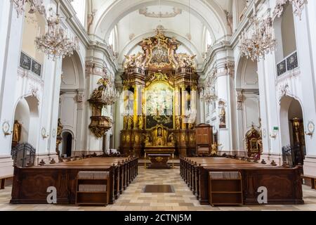 Linz, Austria – May 25, 2017. Interior view of Ursulinenkirche (Ursuline Church) in Linz, Austria, toward the high altar. Stock Photo