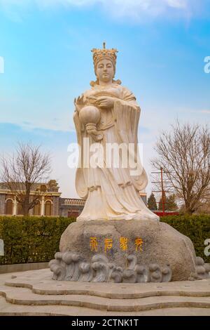 Tianjin, China - Jan 16 2020: Mazu is a Chinese sea goddess, the statue situated on the side of Tianhou Temple at Guwenhua Jie street. Her worship spr Stock Photo