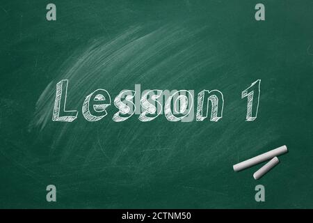 Lettering Lesson 1 on green chalkboard. Part 1 of 10 Stock Photo