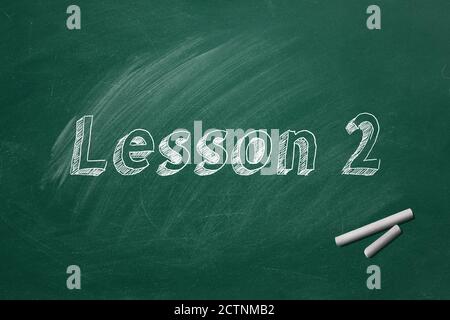 Lettering Lesson 2 on green chalkboard. Part 2 of 10 Stock Photo