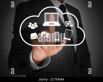 Businessman touching a virtual screen Stock Photo