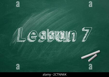 Lettering Lesson 7 on green chalkboard. Part 7 of 10 Stock Photo