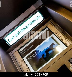 London UK, September 24 2002, Lloyds Bank Automated Cash And Cheque Deposit Machine Alow customers To Deposit Money Without Delays Stock Photo