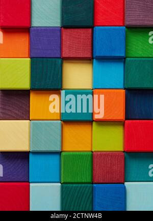 Multi-colored wooden toy blocks background Stock Photo