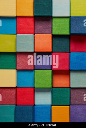 Multi-colored wooden toy blocks background Stock Photo