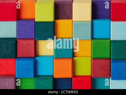 Multi-colored wooden toy blocks background Stock Photo