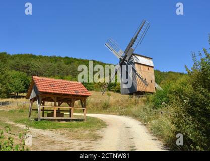 Traditional Windmill made from wood in Germany Stock Photo