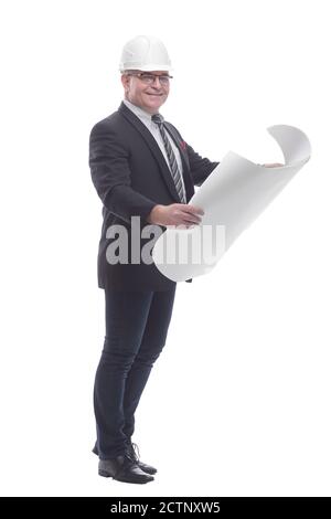 side view. smiling architect reading a new drawing. Stock Photo