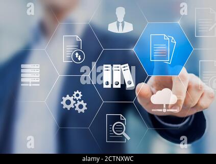 Document Management System (DMS) used to store, search and manage review process and users for corporate files and information in enterprise. Concept Stock Photo
