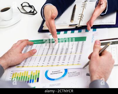 Business people working on financial data Stock Photo