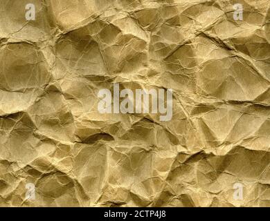 Crumpled paper parchment rustic background texture. Closeup Stock Photo