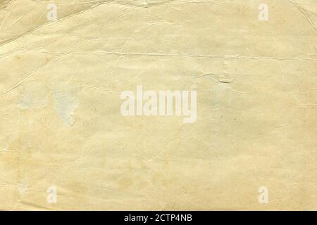 Vintage old worn paper blank background. Closeup Stock Photo