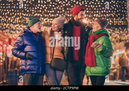 Photo of full family four members meeting cuddle spend noel together wait midnight prepare fireworks celebrate coming newyear x-mas multi-generation Stock Photo